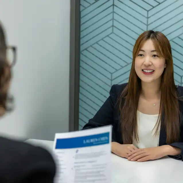 Interviewee smiling at interviewer